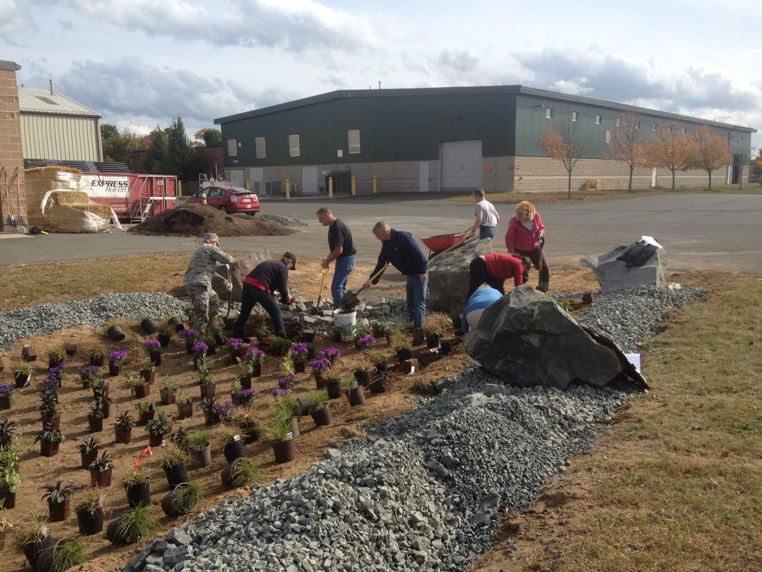 People planting new plantings at Air National Guard, Westfield, MA